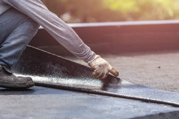 Professional Emergency Waterproofing technician working in Alexandria, OH